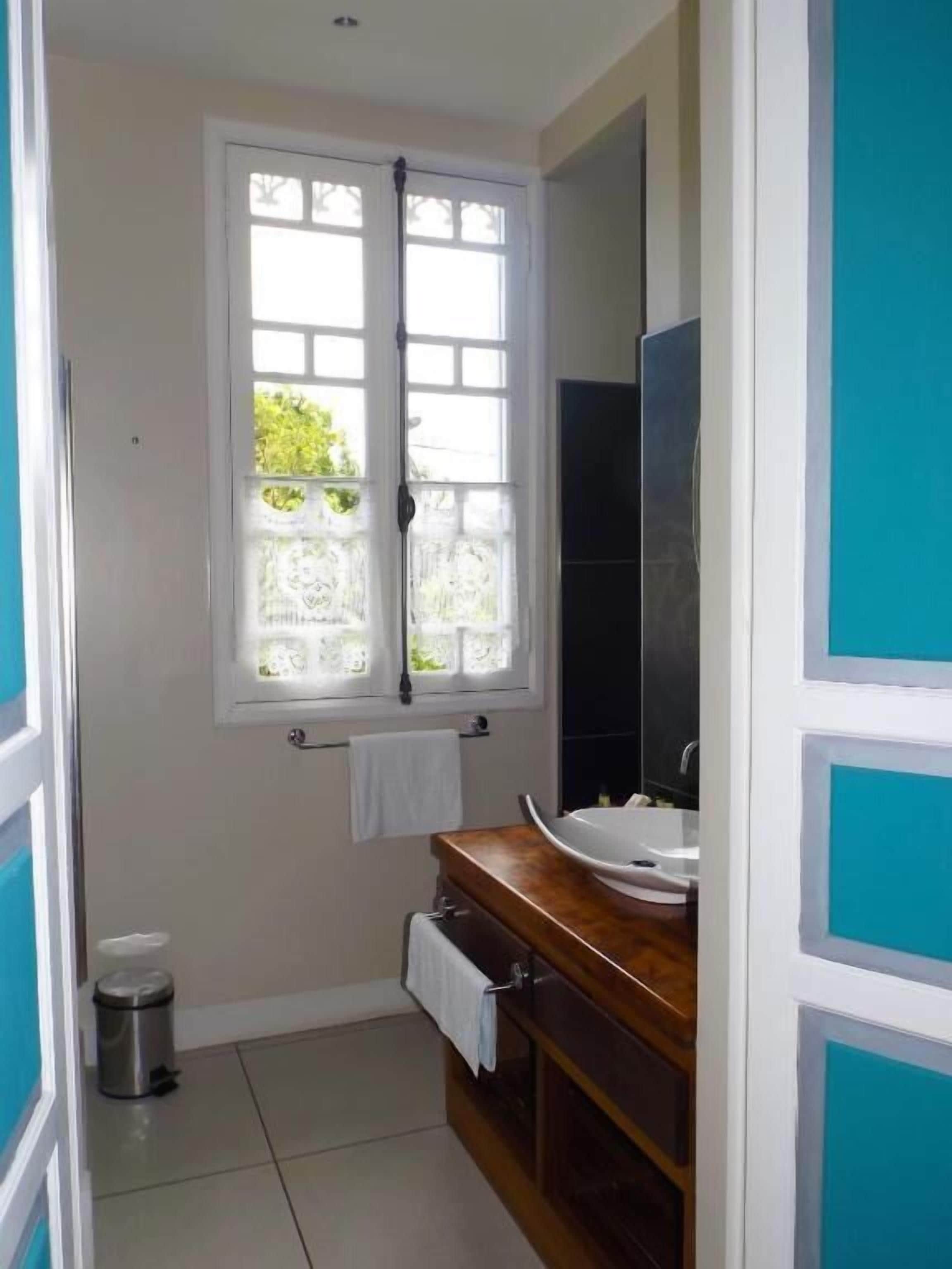 premium suite | bathroom | shower, rainfall showerhead, free toiletries, dressing gowns