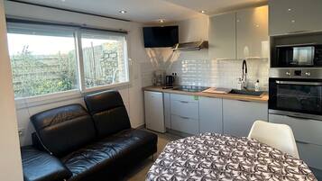 Fridge, microwave, stovetop, coffee/tea maker