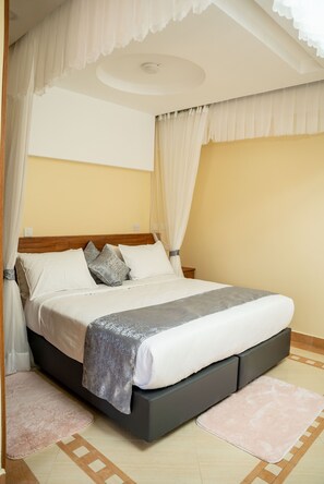 Individually furnished, desk, laptop workspace, blackout curtains