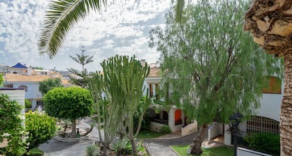 Holiday Home 'Casa en la Playa con Piscinas V' with Shared Pool and Air Conditioning