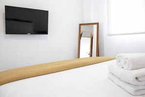 1 chambre, coffres-forts dans les chambres, fer et planche à repasser