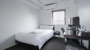 1 slaapkamer, een bureau, gratis wifi, beddengoed