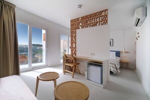 Deluxe Double Room, Balcony, Sea View | Living area | 40-inch flat-screen TV with satellite channels, TV - Hotel Bini (Manacor)