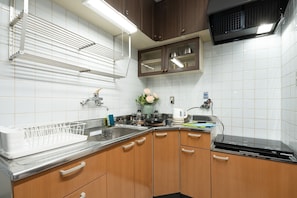 Fridge, microwave, stovetop, cookware/dishes/utensils