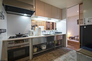 Fridge, microwave, cookware/dishes/utensils