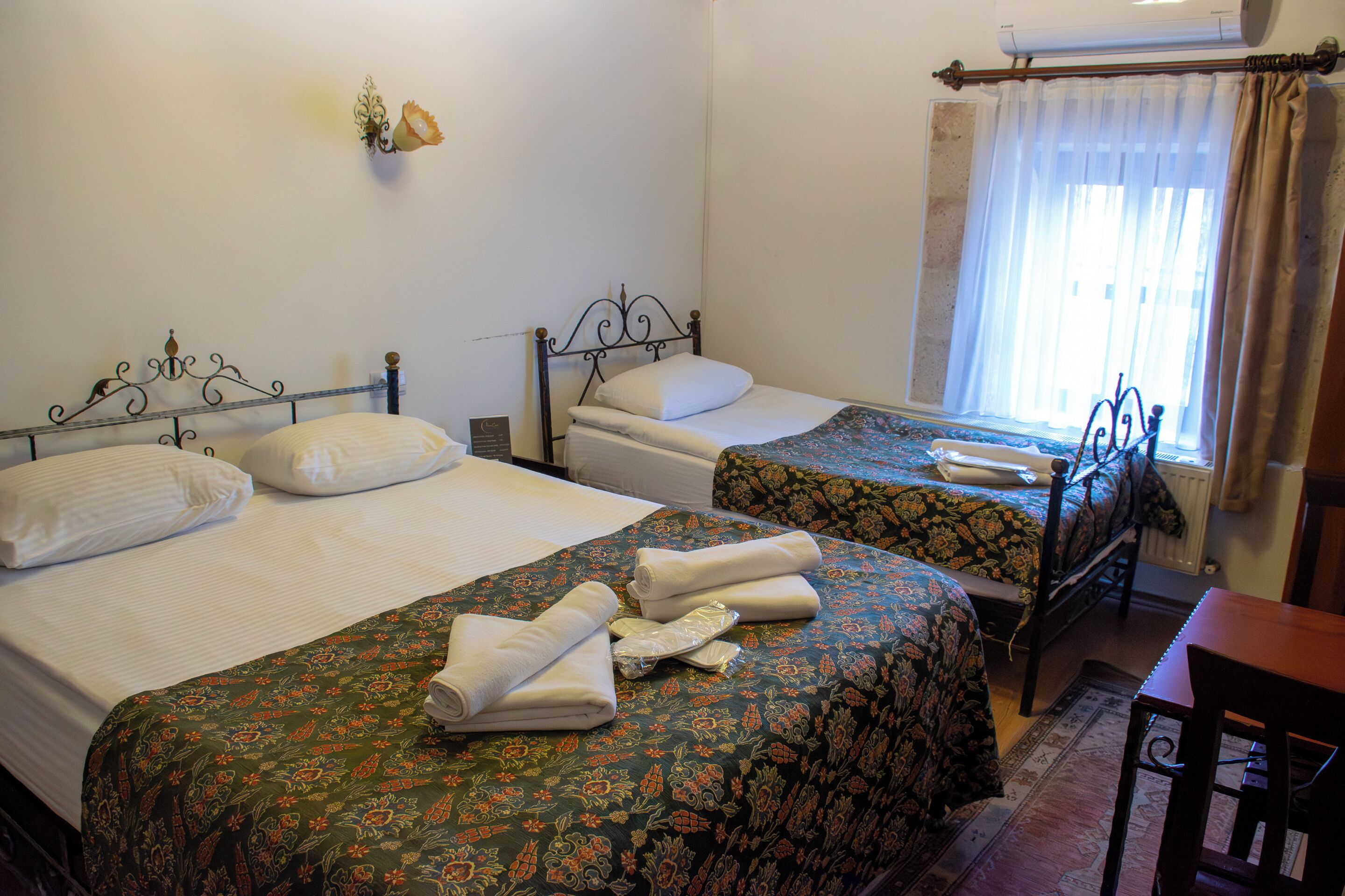 Family Triple Room, Multiple Beds, Courtyard View, Ground Floor | Egyptian cotton sheets, premium bedding, down comforters