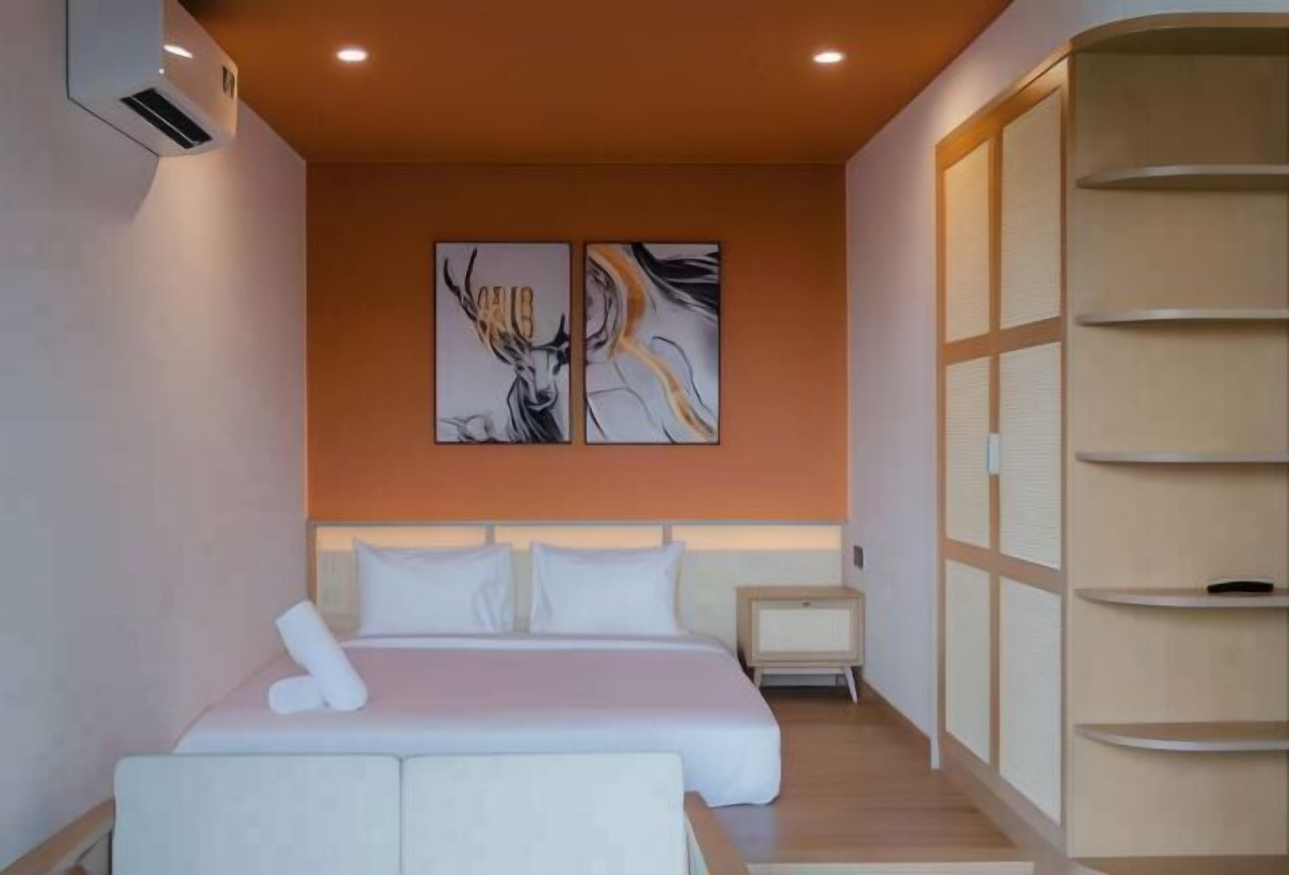 Pillowtop-bedden, een minibar, een bureau, een laptopwerkplek