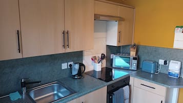 Apartment | Private kitchen | Fridge, microwave, oven, stovetop