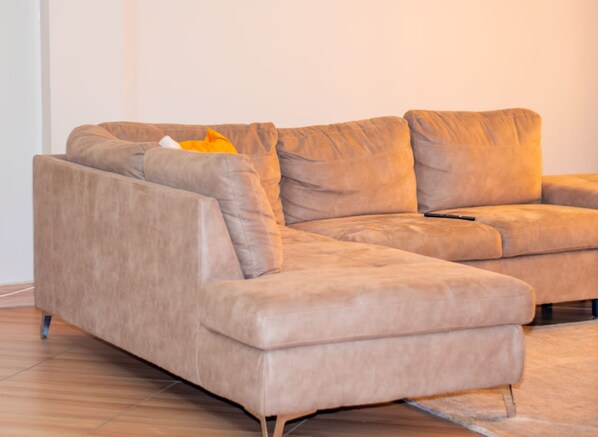 Apartment | Living room | 24-inch flat-screen TV with digital channels, TV - Affordable Heaven by CHH (Nairobi)