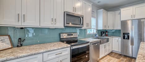 Fridge, microwave, dishwasher, coffee/tea maker