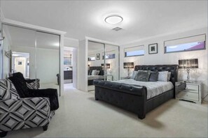 Basic House, Multiple Beds | 3 bedrooms, laptop workspace, iron/ironing board, bed sheets