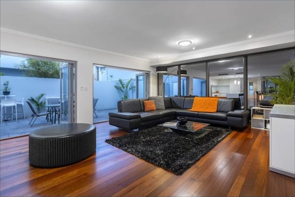 Basic House, Multiple Beds | Living area | TV