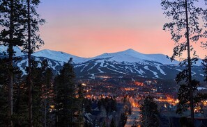 A town nestled between snow-capped mountains, with visible buildings and roads. - Modern 3Br + Den Home in Breck!- Moonstone Modern (Breckenridge)