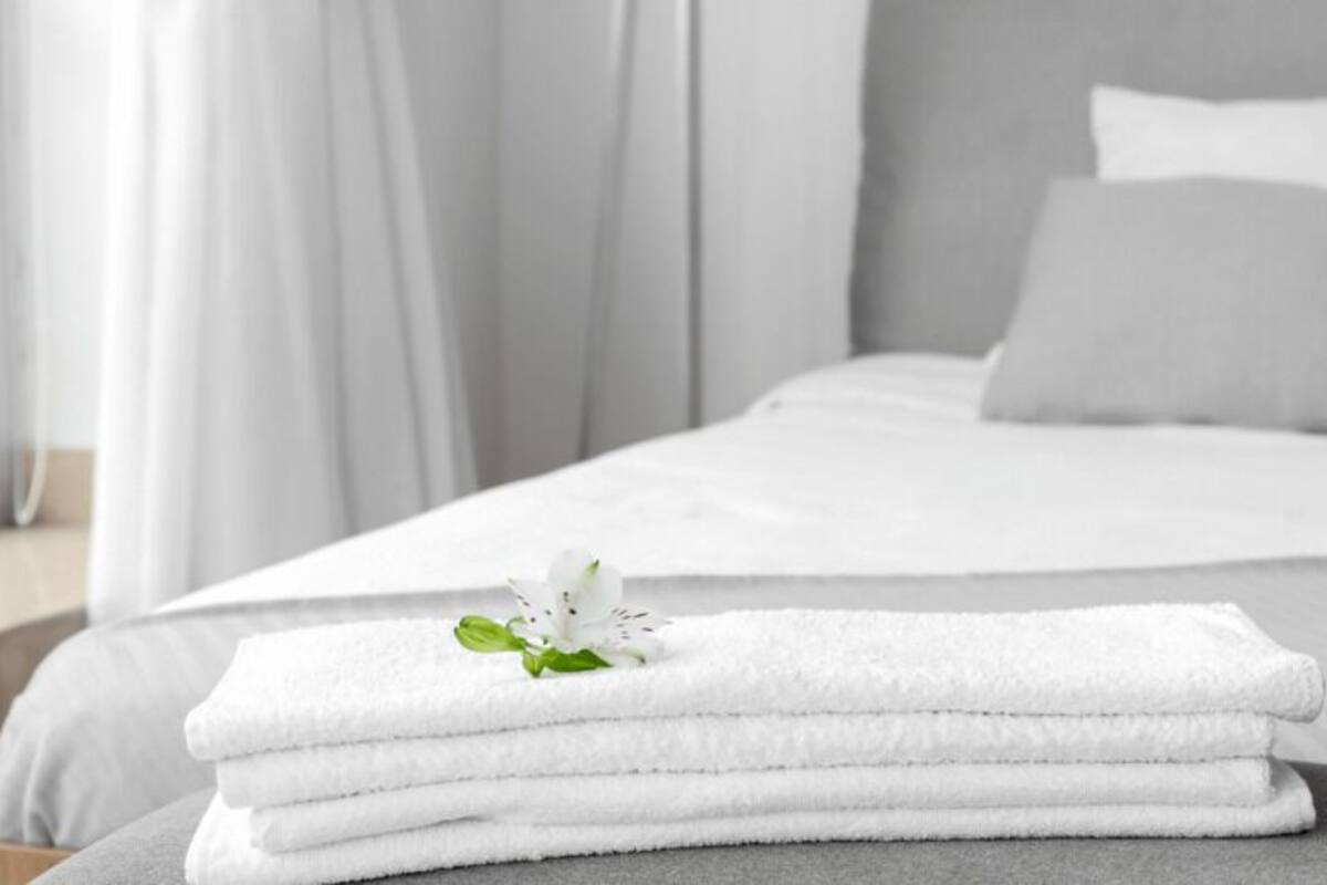 Premium bedding, desk, laptop workspace, free WiFi
