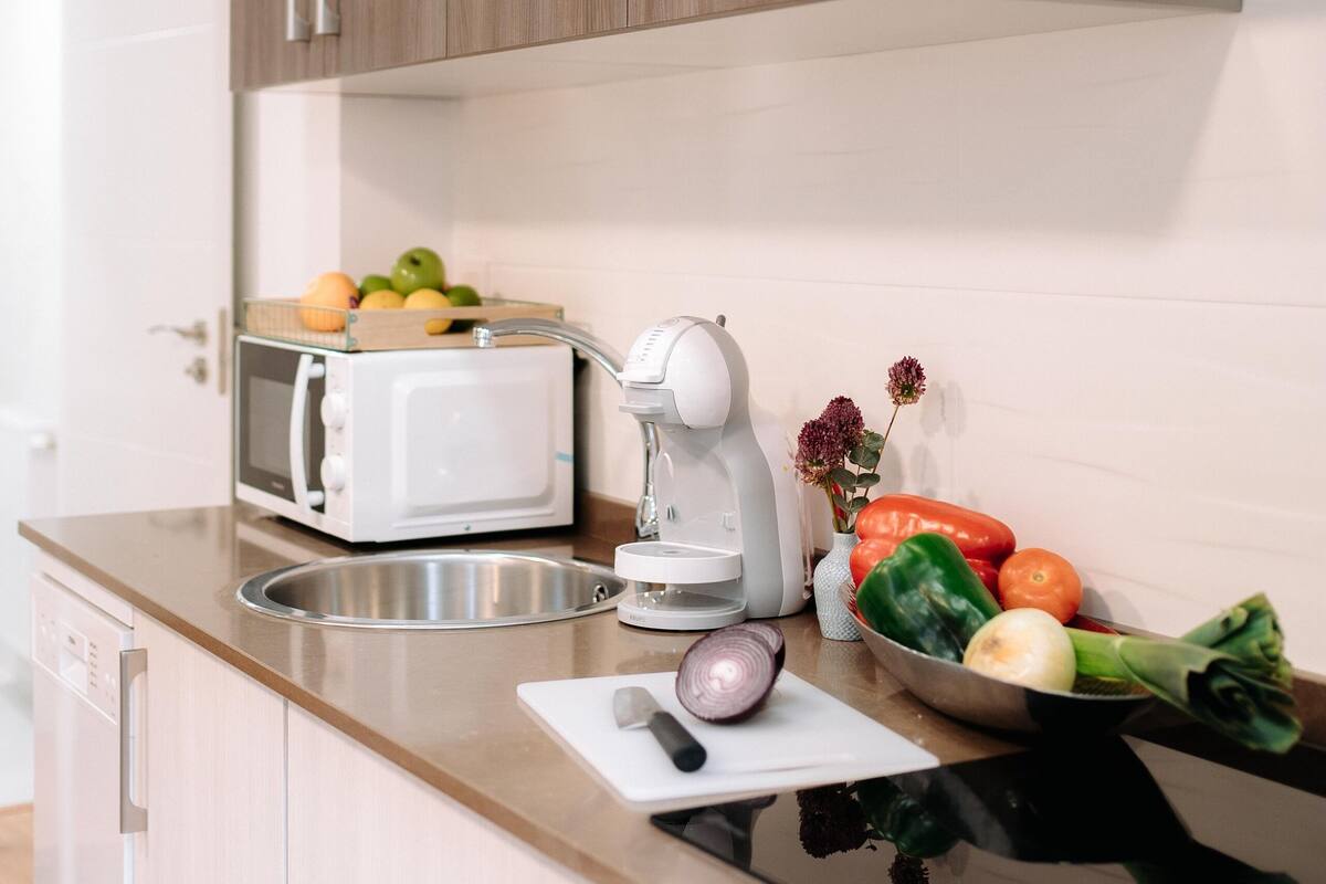 design duplex | private kitchen | full-sized fridge, microwave, oven, stovetop