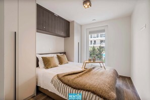 2 slaapkamers, een strijkplank/strijkijzer, reisbedje, wifi