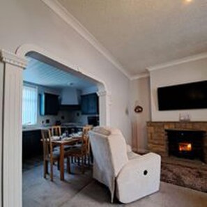 Cottage, Multiple Beds | Living area | Fireplace