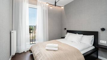 Apartment, 1 Bedroom, Balcony | 1 bedroom, bed sheets