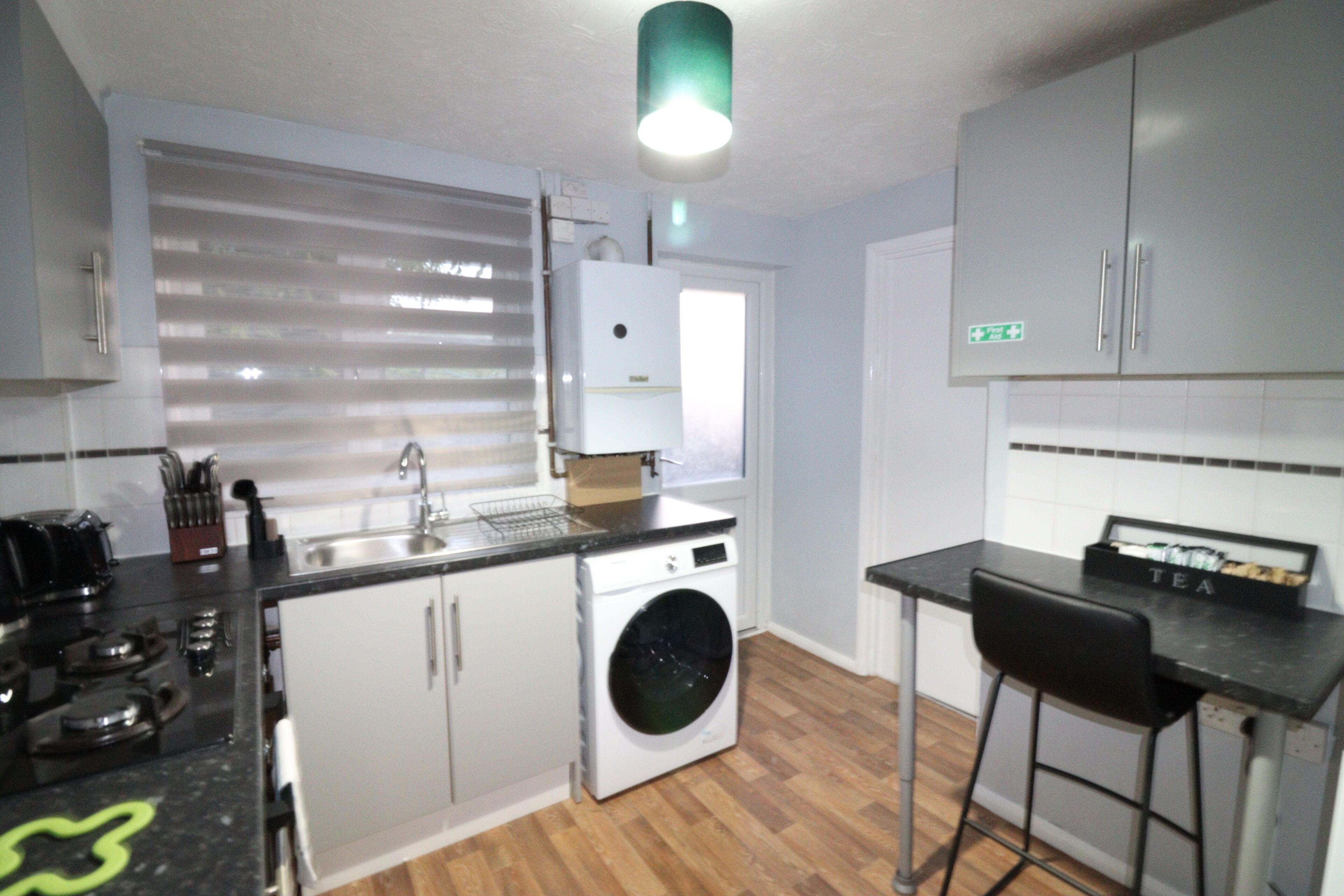 Fridge, oven, electric kettle, toaster