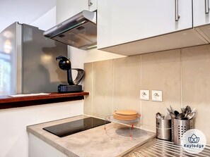 Fridge, microwave, stovetop, coffee/tea maker