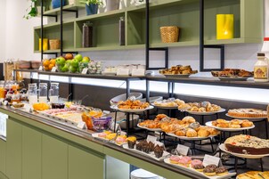 Daily buffet breakfast (EUR 15 per person)