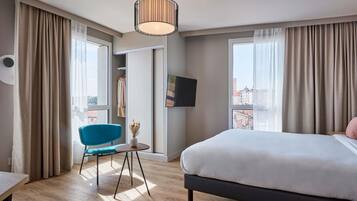 In-room safe, laptop workspace, blackout curtains, soundproofing