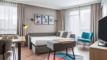Apartment, 1 Bedroom | Living area | 32-inch flat-screen TV with digital channels, offices
