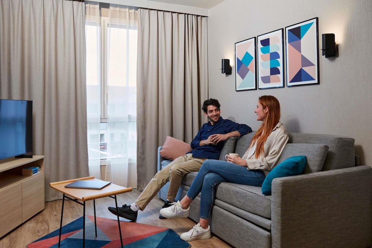 Apartment, 1 Bedroom | In-room safe, laptop workspace, blackout drapes, soundproofing