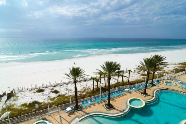 Stunning views of the gorgeous pools and crystal clear water of the ocean