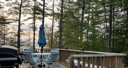 Webster Camp - rustic getaway with Webster Lake access, fire pit & large deck!