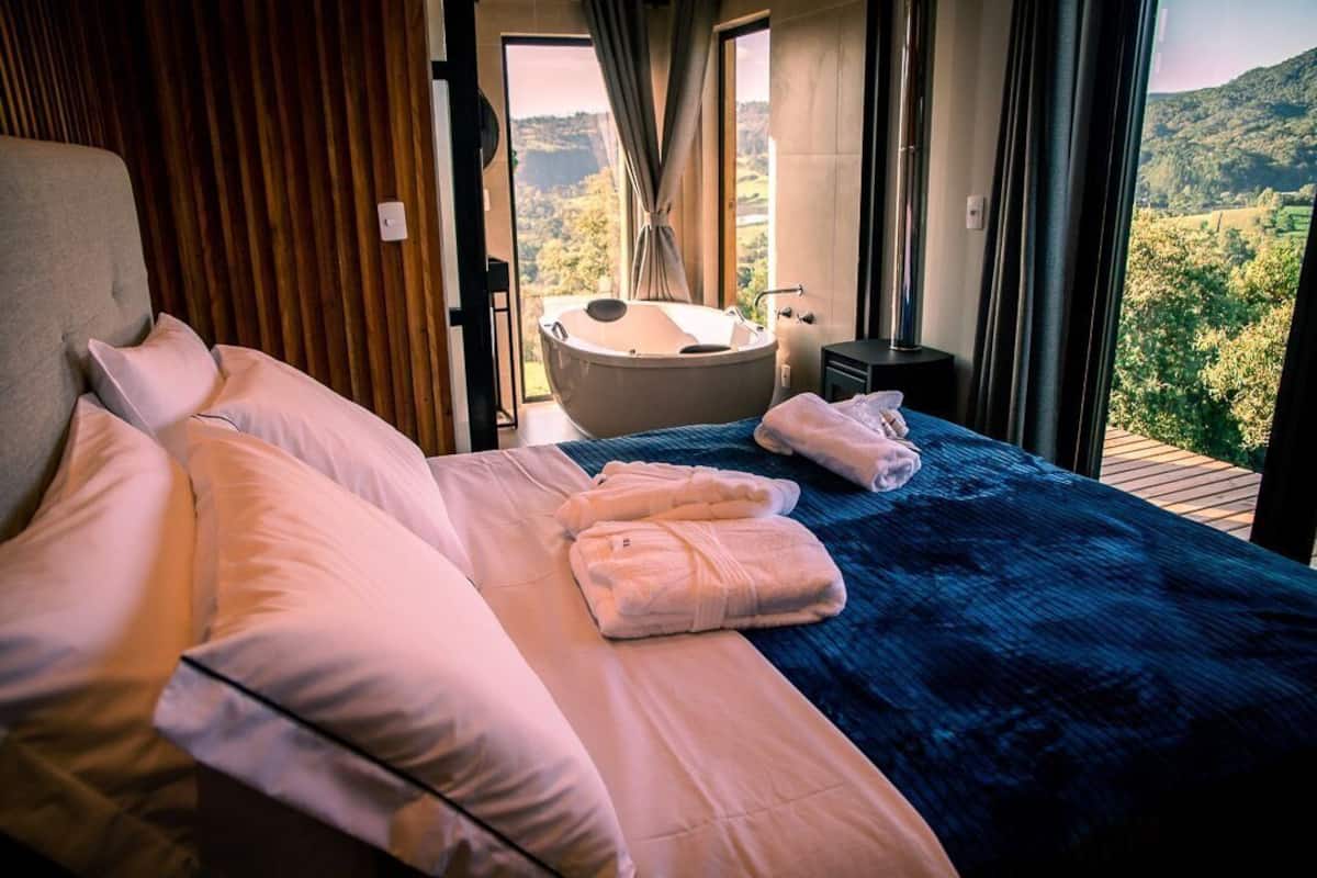Baita Deluxe, 1 letto queen, idromassaggio, vista montagna | 1 camera, con stile personalizzato, tende oscuranti, Wi-Fi gratuito