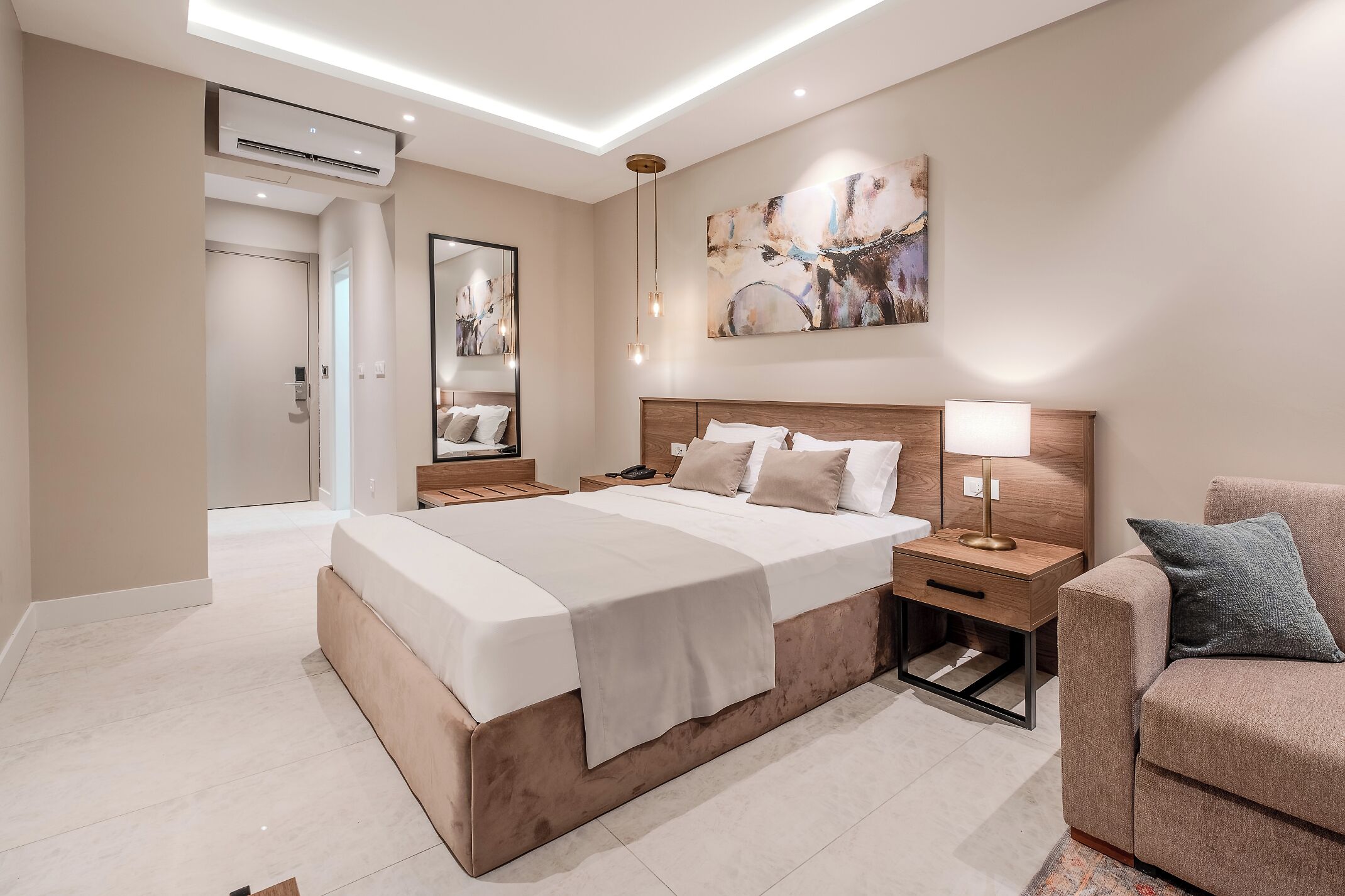 deluxe room | 2 bedrooms, minibar, in-room safe, individually decorated