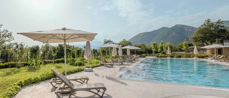 Seasonal outdoor pool, open 9:00 AM to 8:00 PM, free pool cabanas