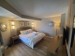 1 habitación, tabla de planchar con plancha y cuna de viaje