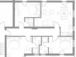 A floor plan of a hotel with multiple bedrooms, a dining area, and a kitchen. - Apartment Tulpe by Interhome (Velden am Wörthersee)
