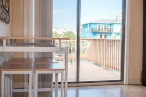 Enjoy an outdoor space with a sliding glass door leading to a furnished deck.