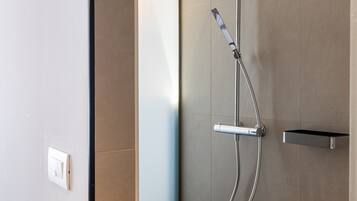 Shower, free toiletries, hair dryer, towels
