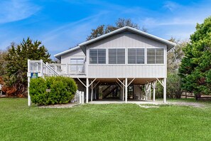 Exterior - Beach home with huge lawn, open deck, covered patio & grill (Edisto Beach)