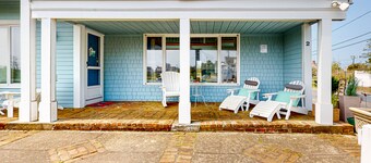 Seaside condo with patio, beach access, loft, board games, gas grill, & firepit