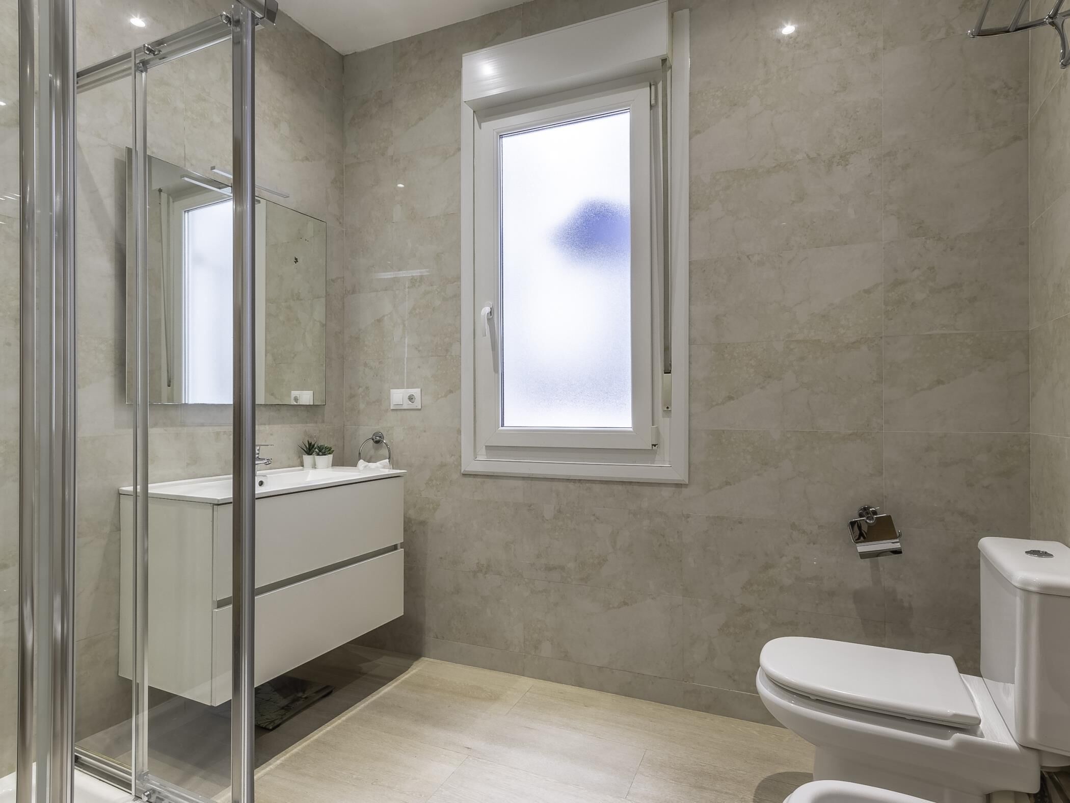 Shower, eco-friendly toiletries, hair dryer, towels