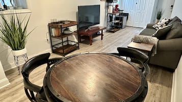 Smart TV, fireplace, DVD player, books