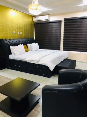 Royal Suite | Egyptian cotton sheets, premium bedding, memory foam beds - T Golden Villa Hotel (Enugu)