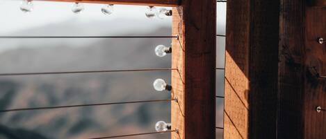 A wooden structure with multiple light bulbs.