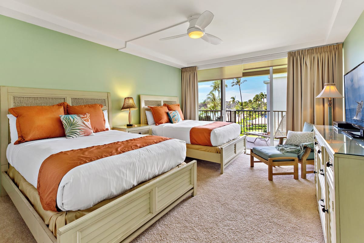 Suite Premium, varias camas, frente al mar (2 Baths) | Caja fuerte, decoración individual, mobiliario individual