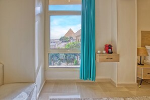 Deluxe Suite Panoramic Pyramids & Sphinx View | View from room - The Gate Hotel Front Pyramids & Sphinx View (Giza)