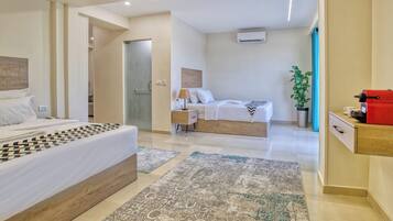 Ropa de cama de alta calidad, colchones Select Comfort y minibar