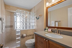 Shower, hair dryer, towels