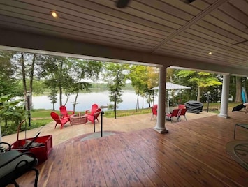 Back deck with seating. 