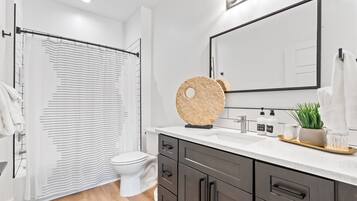 Hair dryer, towels, soap, shampoo