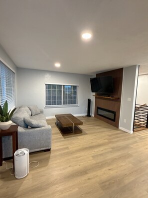 Smart TV, fireplace, foosball